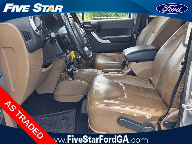 Used 2016 Silver Jeep Unlimited Sahara image 5