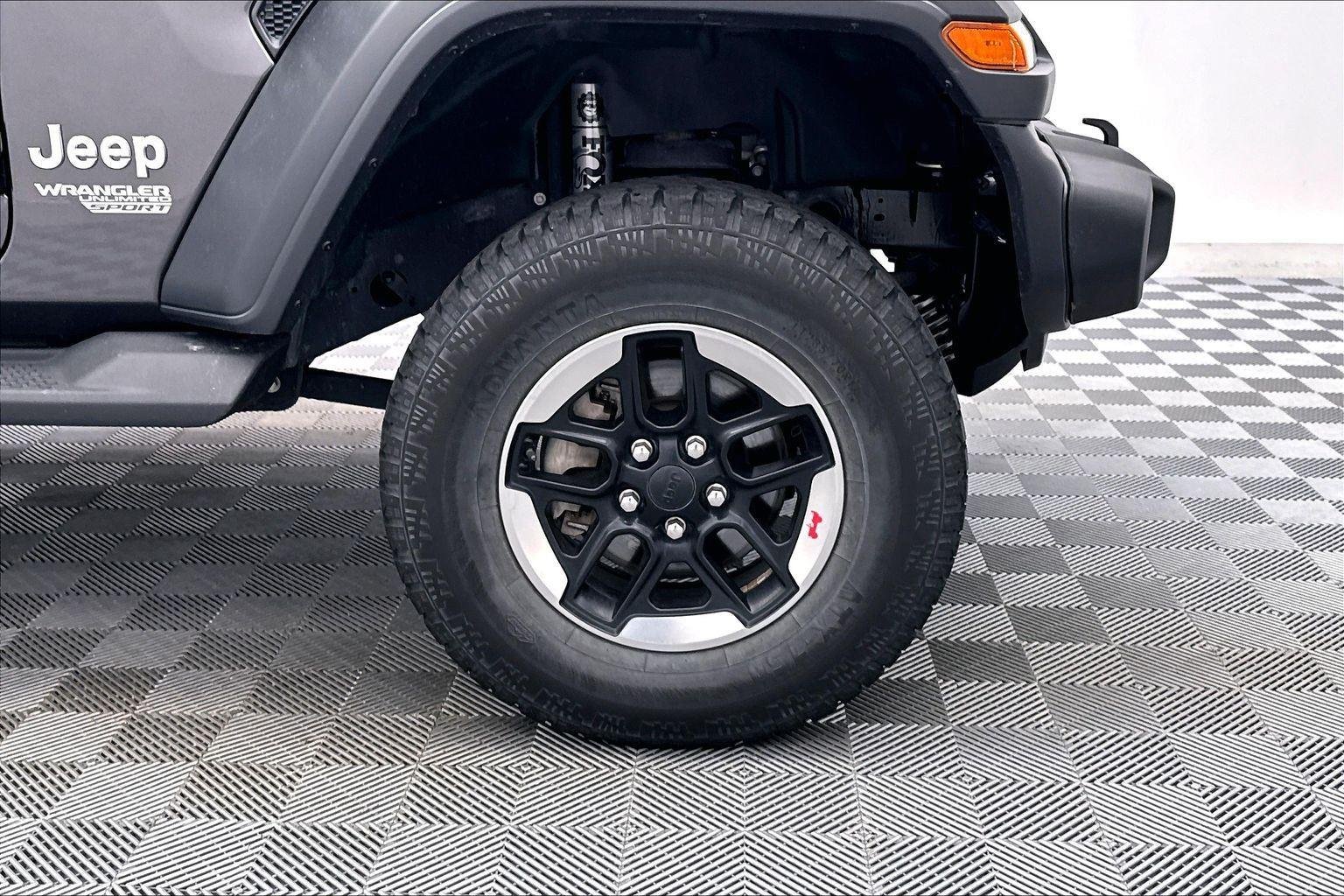 Used 2018 Granite Crystal Metallic Clearcoat Jeep Sport image 25