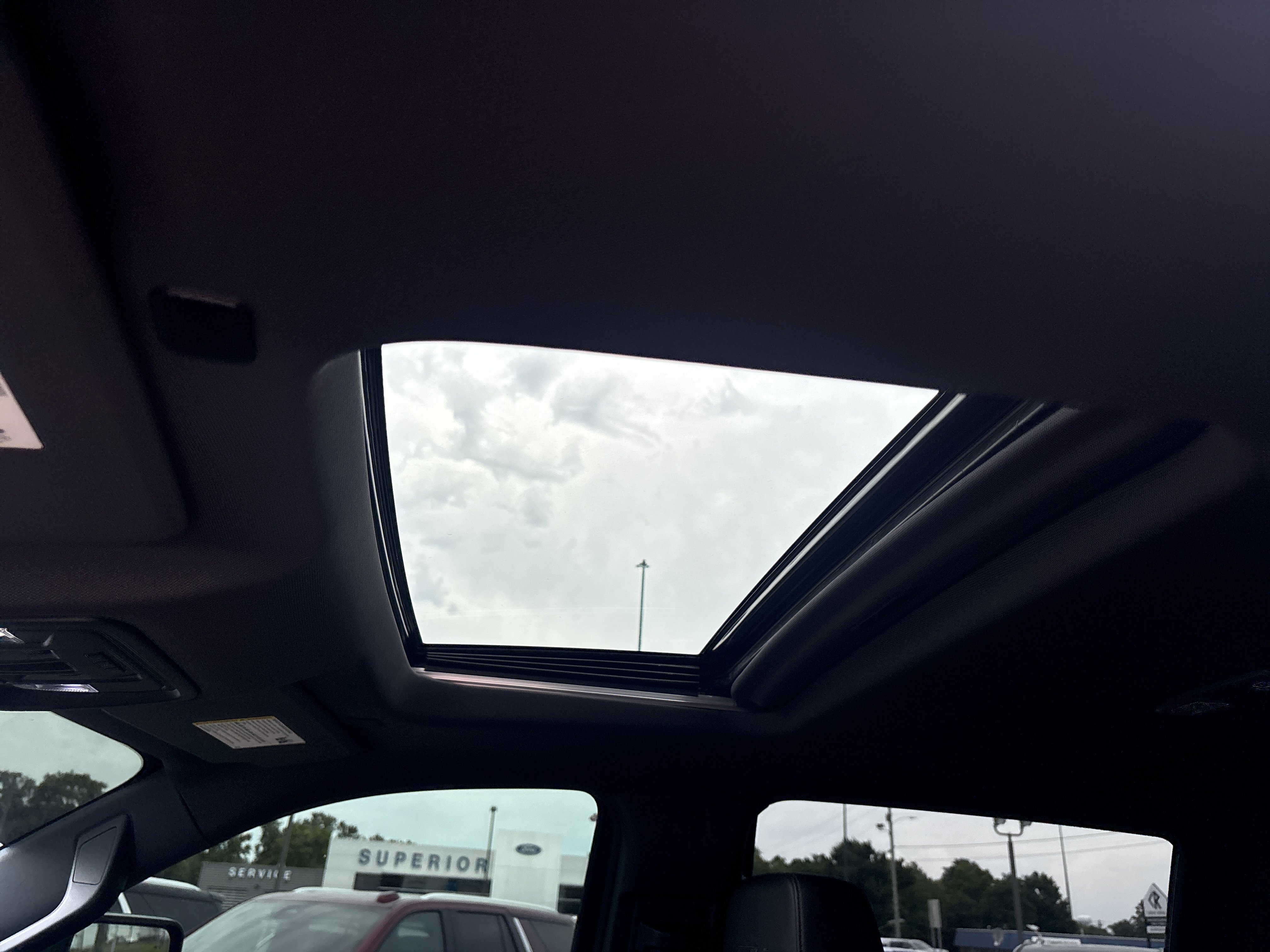 Used 2024 Thunderstorm Gray GMC AT4 image 23