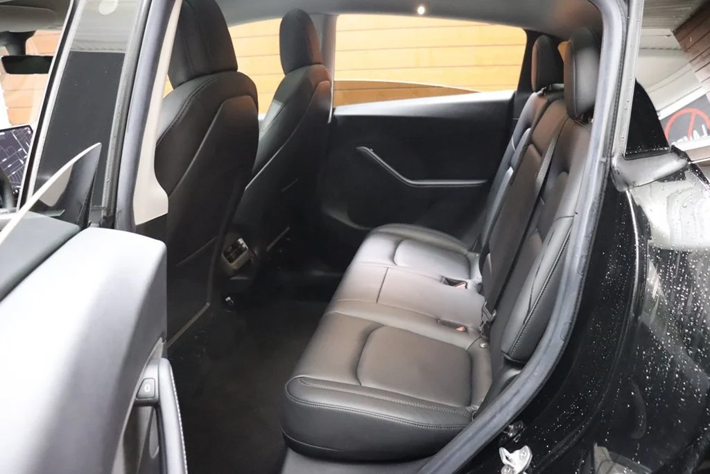 Used 2022 Solid Black Tesla Performance image 34