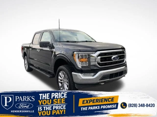 Used 2021 Agate Black Metallic Ford XLT image 1