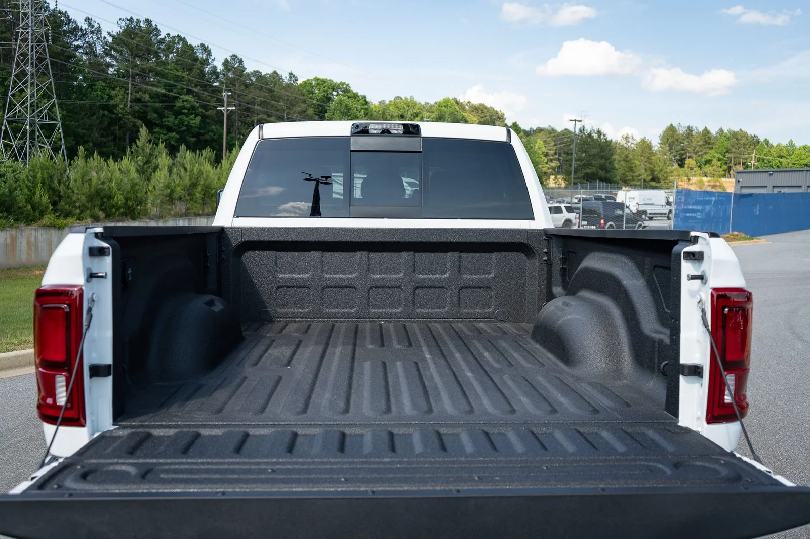 New 2026 Bright White Clear-Coat Exterior Paint RAM Laramie image 16