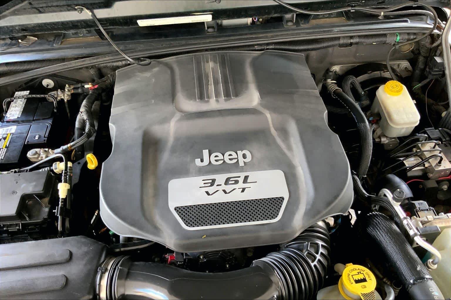 Used 2012 Black Forest Green Pearl Jeep Sport image 29