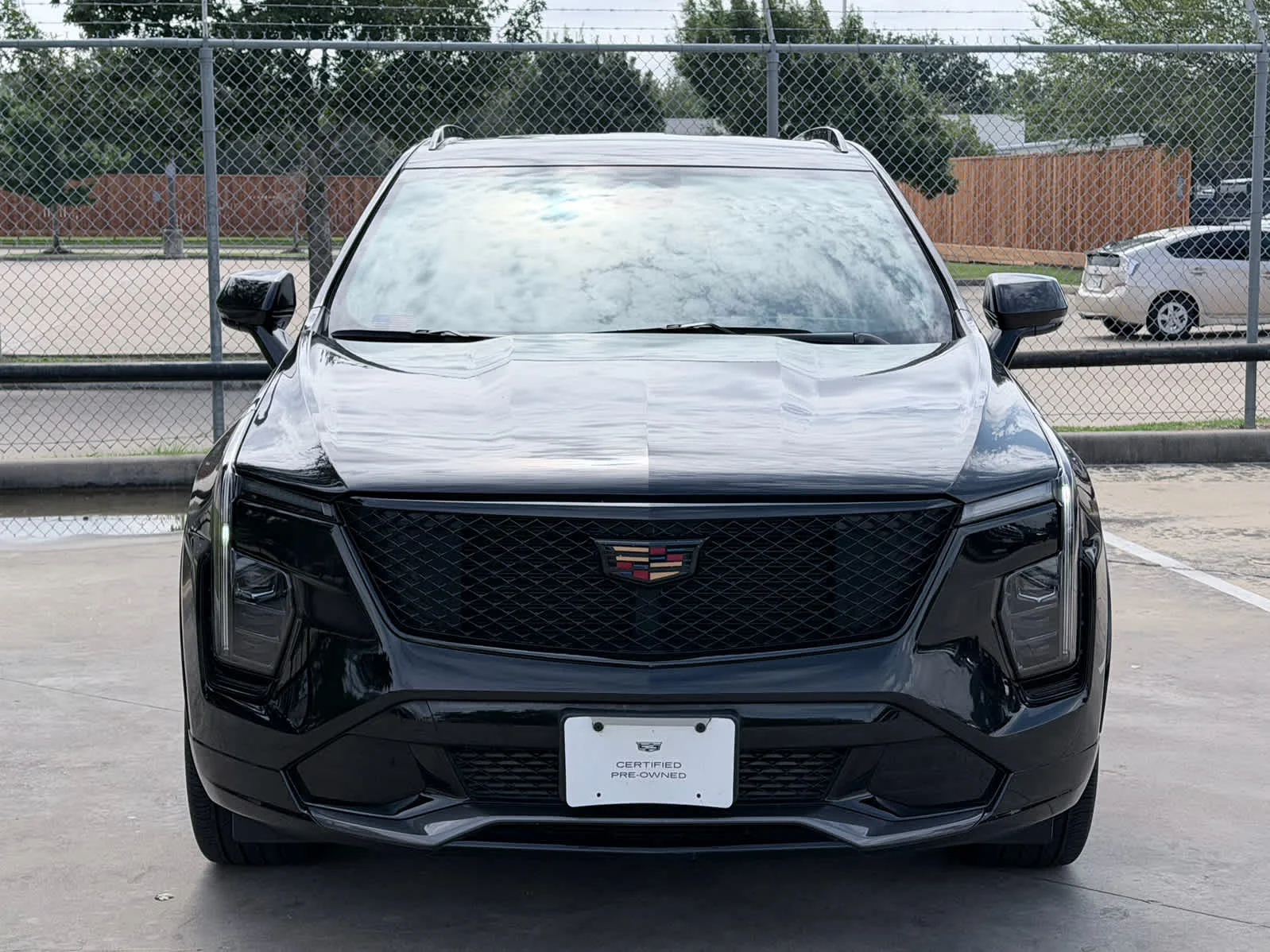 Used 2024 Stellar Black Metallic Cadillac Sport image 2
