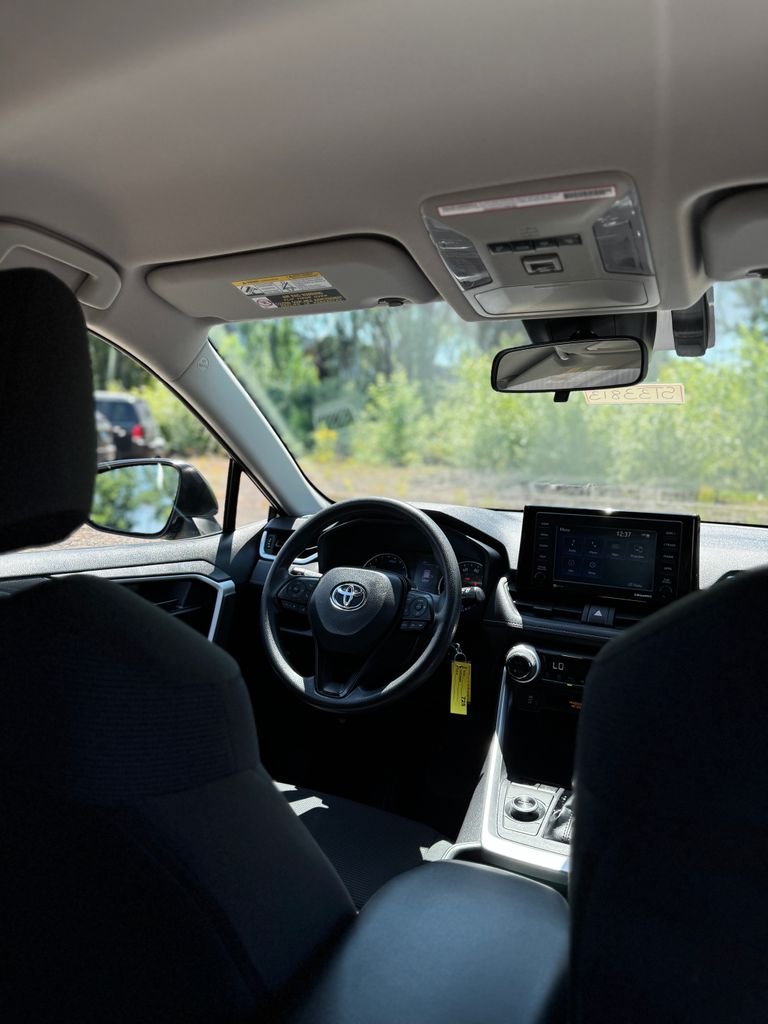 Used 2020 Magnetic Gray Metallic Toyota LE image 28