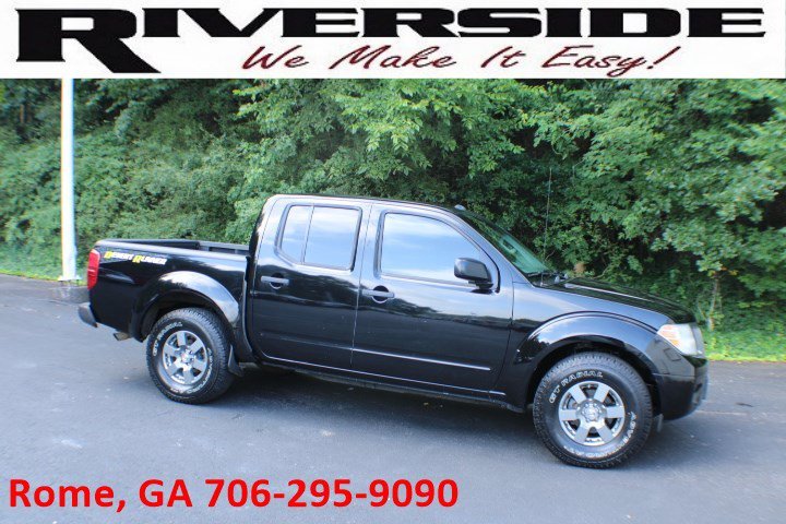 Used 2013 Super Black Nissan Desert Runner image 1