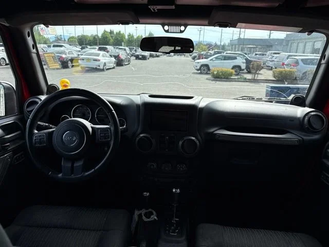 Used 2012 Flame Red Jeep Sport image 16