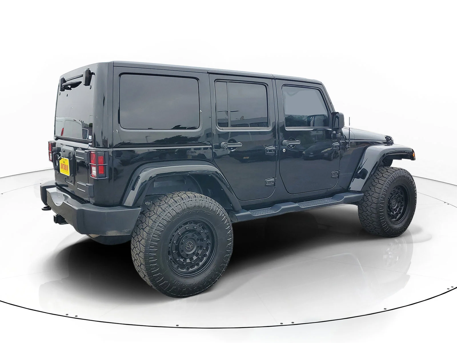 Certified Used 2018 Black Jeep Unlimited Altitude image 3
