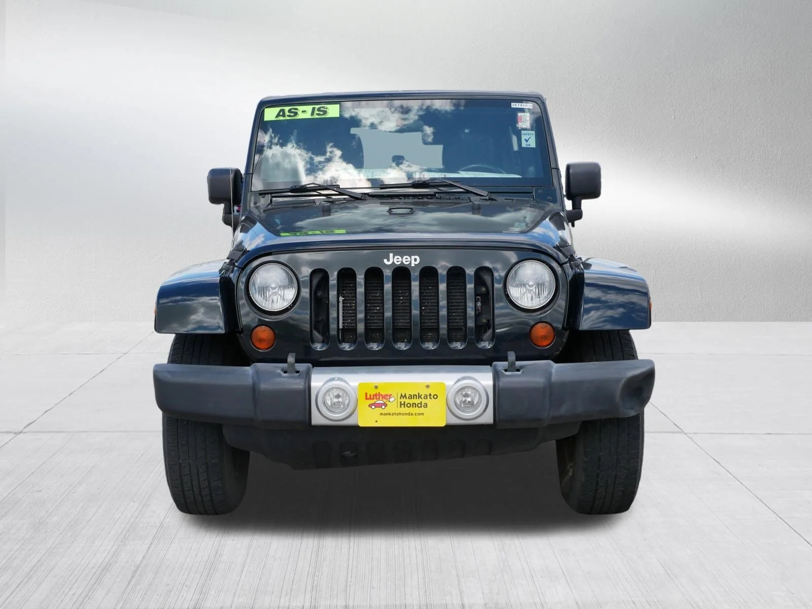 Used 2012 Jeep Wrangler Unlimited Sahara with VIN 1C4BJWEG4CL230755 for sale in Mankato, MN