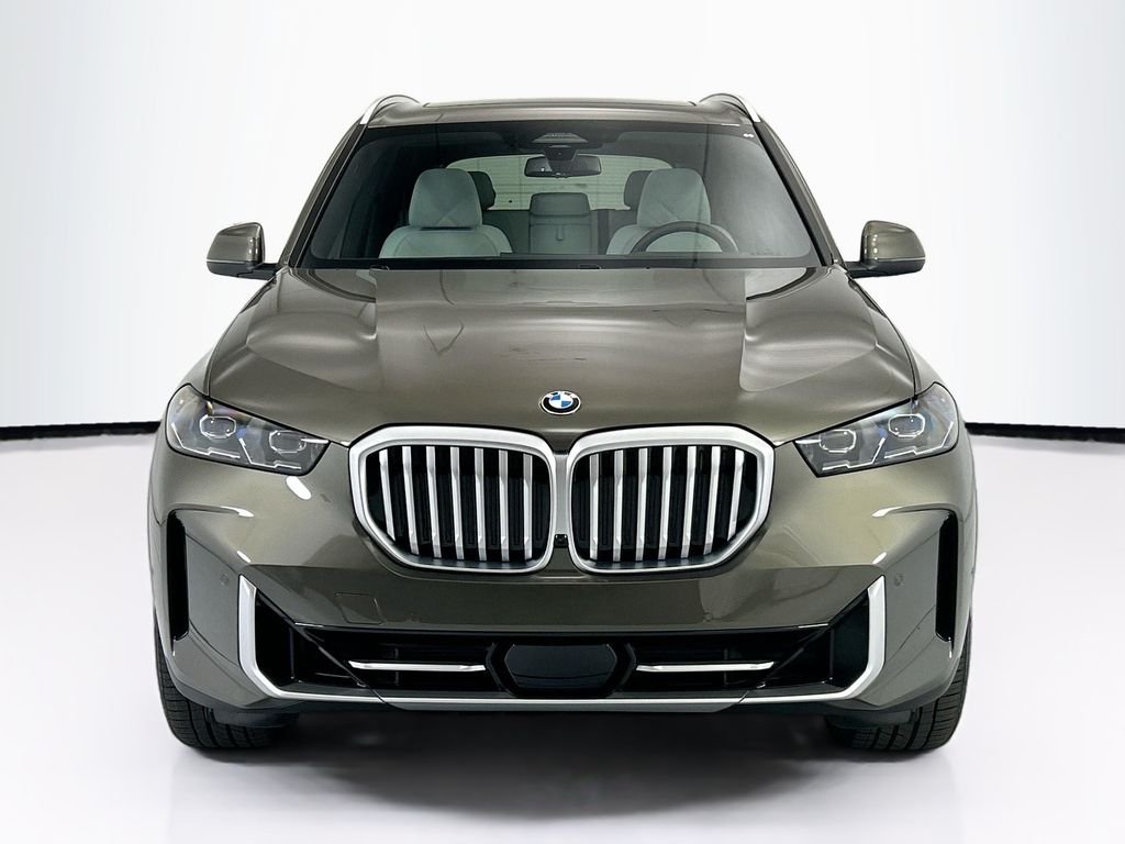 New 2026 Green Metallic BMW sDrive40i image 2