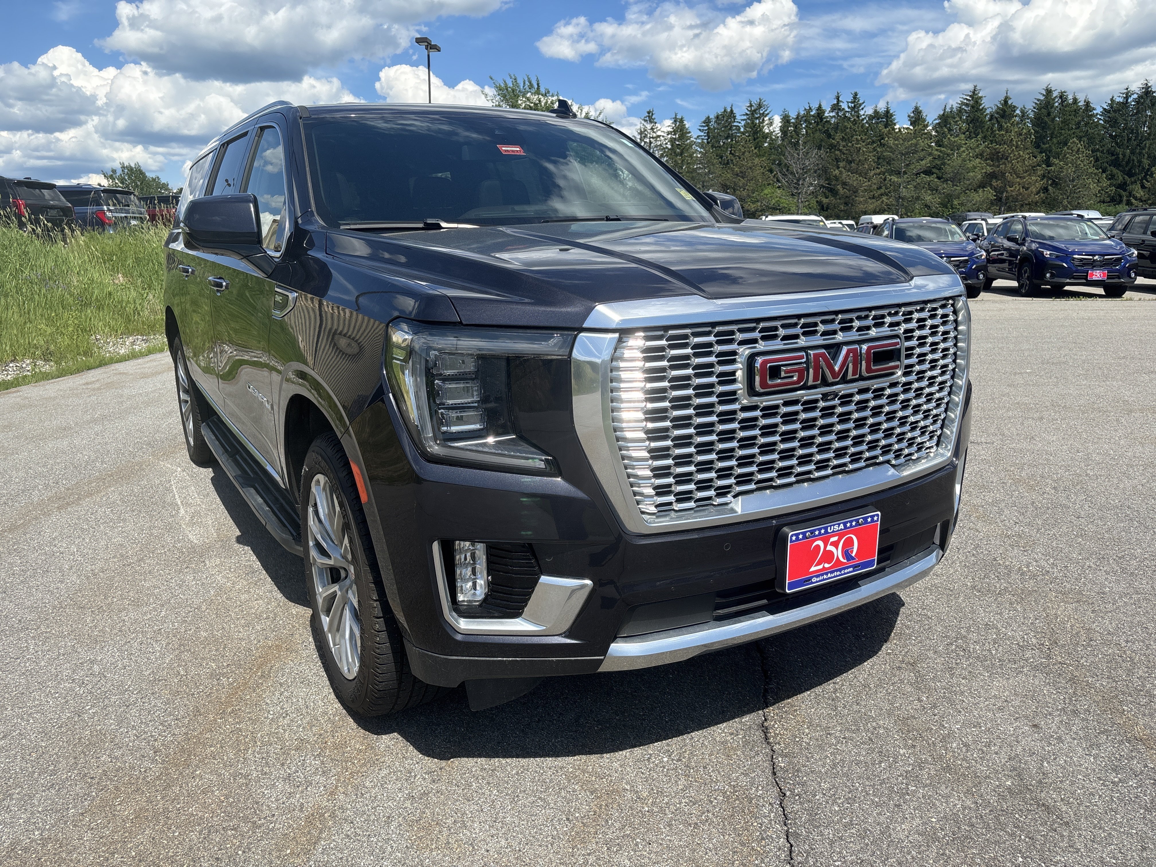 Used 2023 Titanium Rush Metallic GMC Denali image 7
