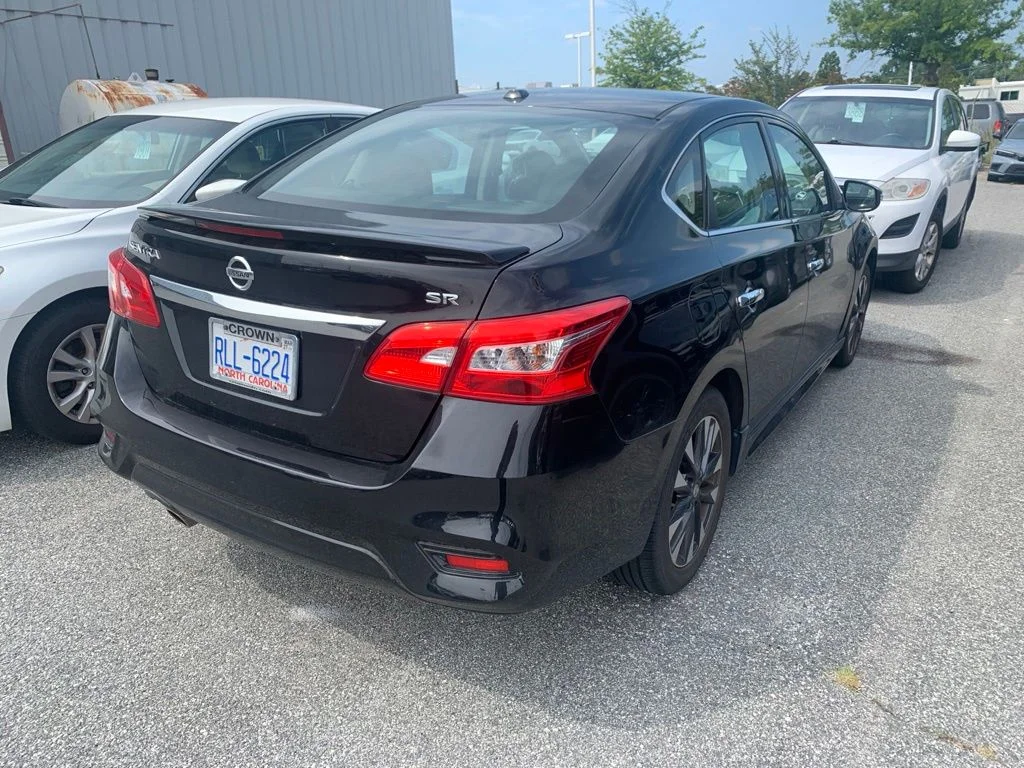 Used 2019 Black Nissan SR image 4