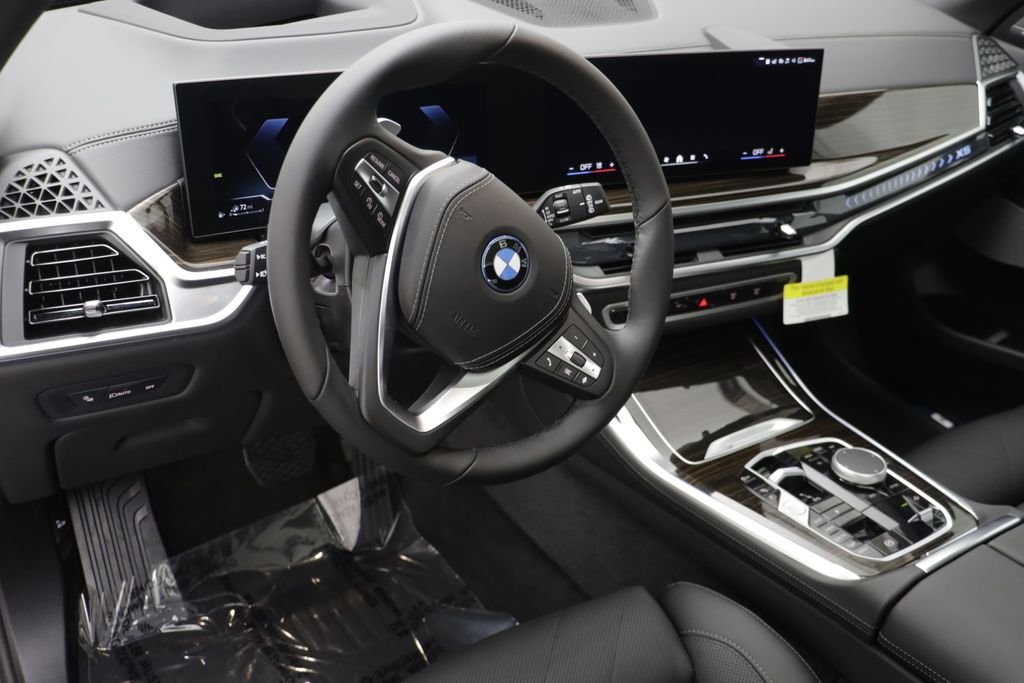 New 2026 Black Sapphire Metallic BMW xDrive50e image 8
