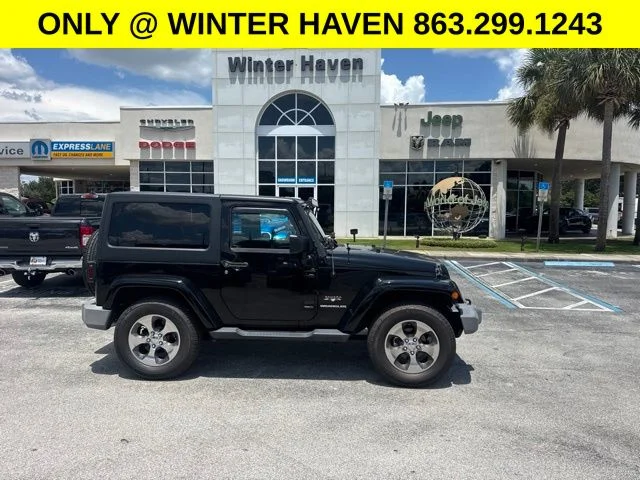 Used 2017 Black Jeep Sahara image 1