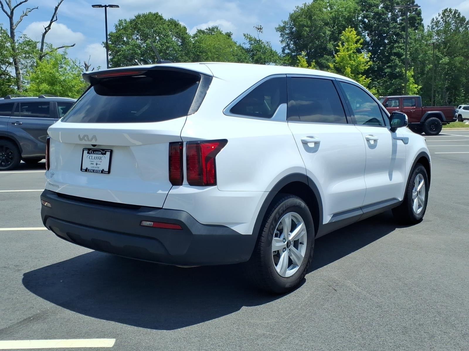Used 2023 Glacial White Pearl Kia LX image 2