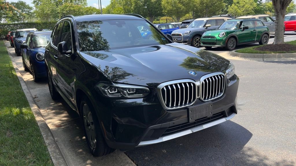 Used 2024 Black Sapphire Metallic BMW xDrive30i image 1