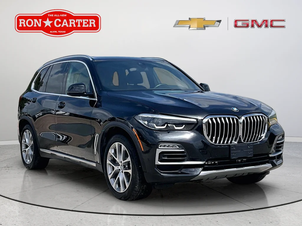 Used 2020 Black BMW sDrive40i image 1