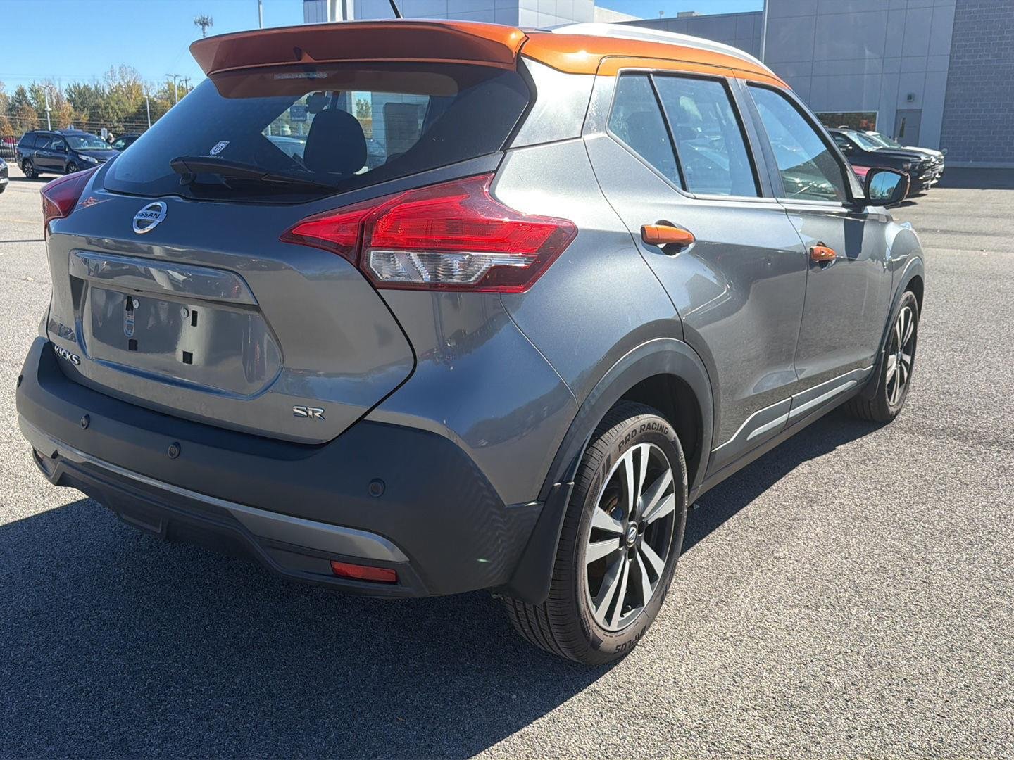 Used 2020 Gun Metallic/Monarch Orange Nissan SR image 3