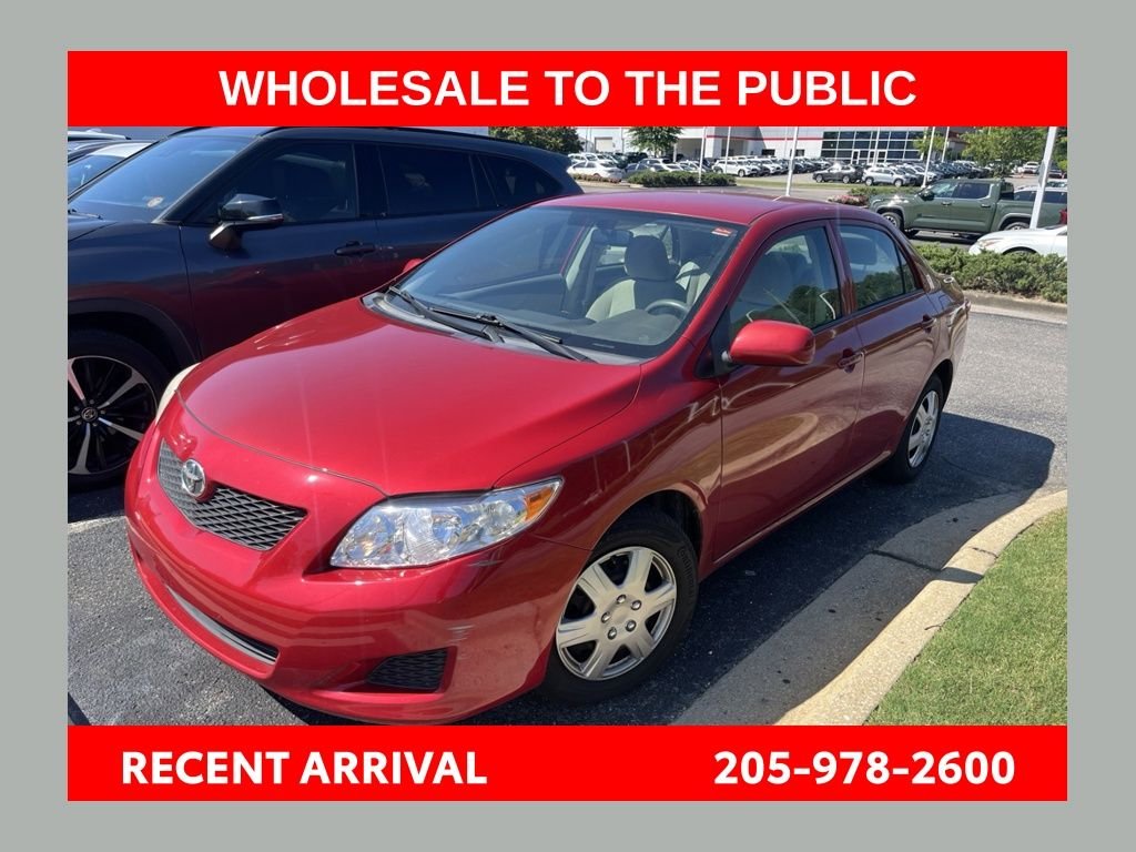 Used 2009 Red Toyota LE image 1
