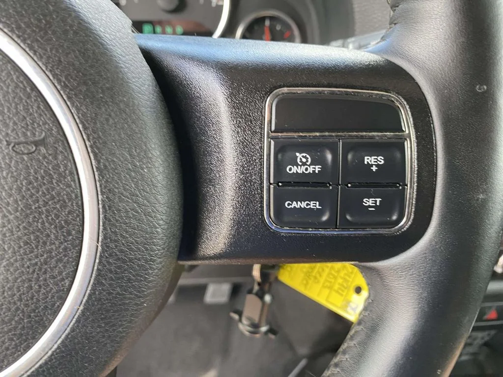 Used 2013 Silver Jeep Sport image 28