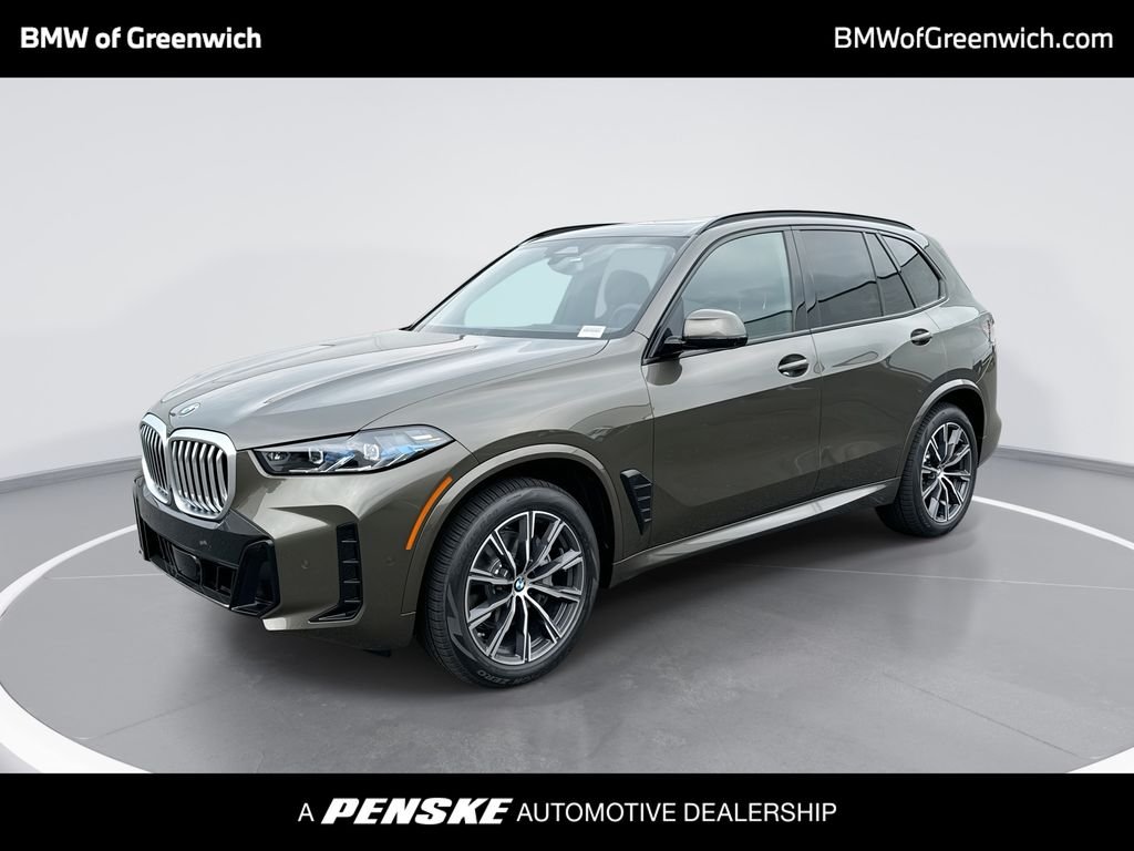 New 2026 Green Metallic BMW xDrive40i image 1