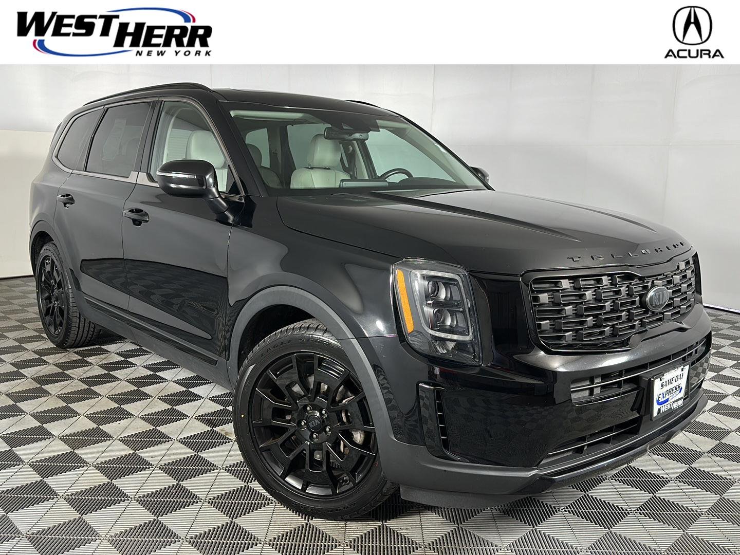Used 2021 Ebony Black Kia EX image 1