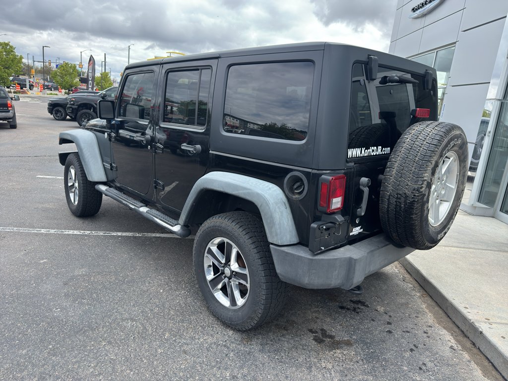 Used 2011 Black Clearcoat Jeep Sport image 3