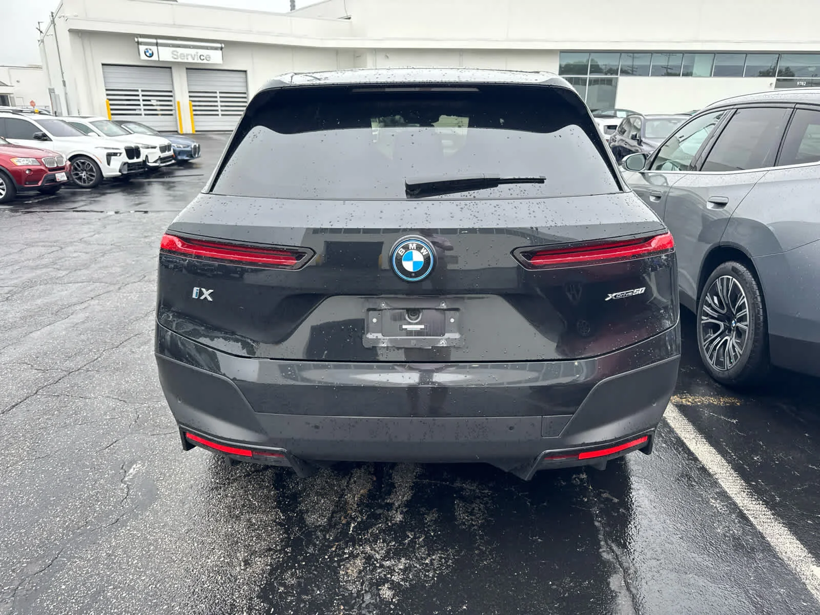Certified Used 2024 Black Sapphire Metallic BMW xDrive50 image 6