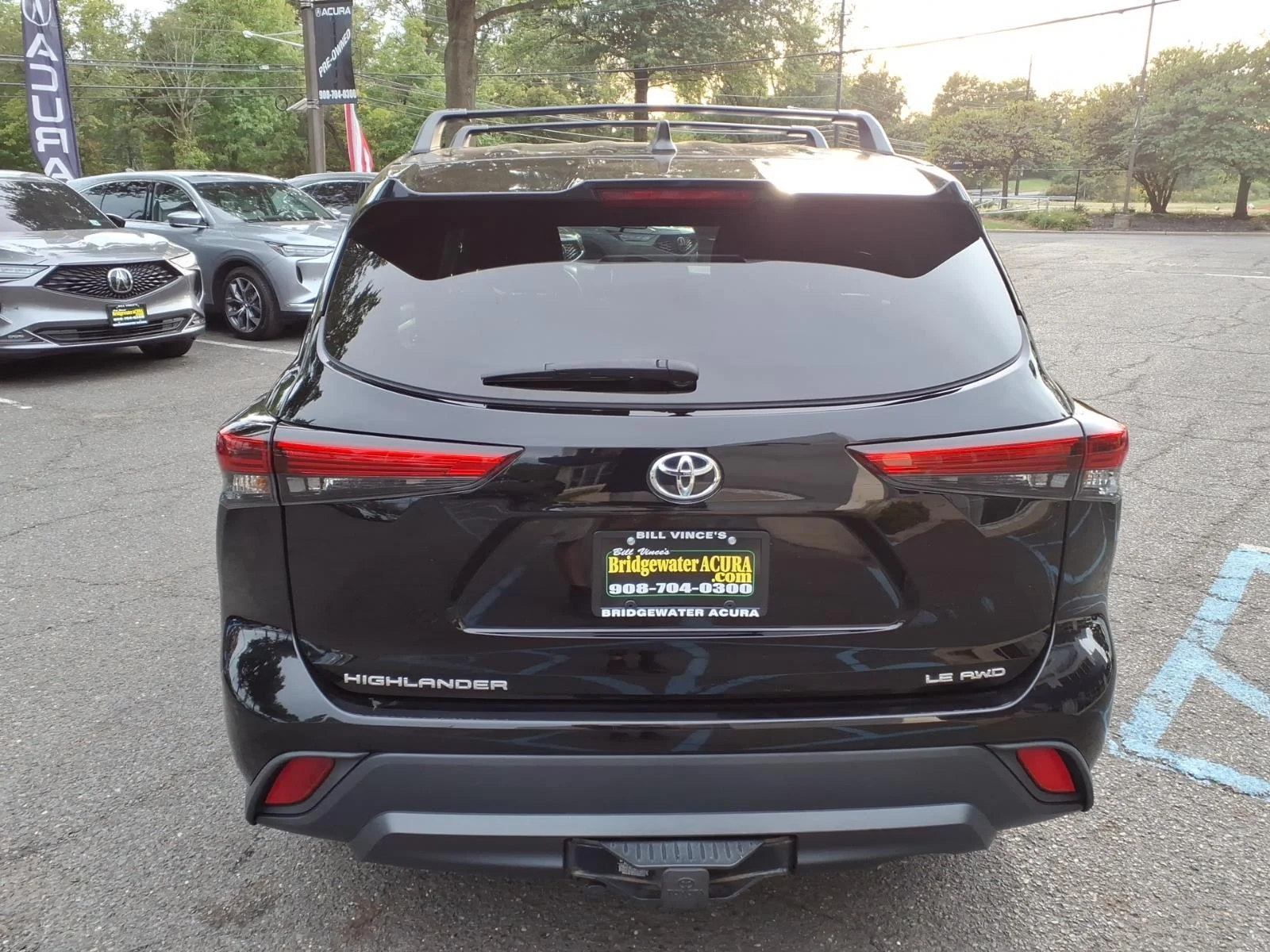 Used 2022 Midnight Black Metallic Toyota LE image 5