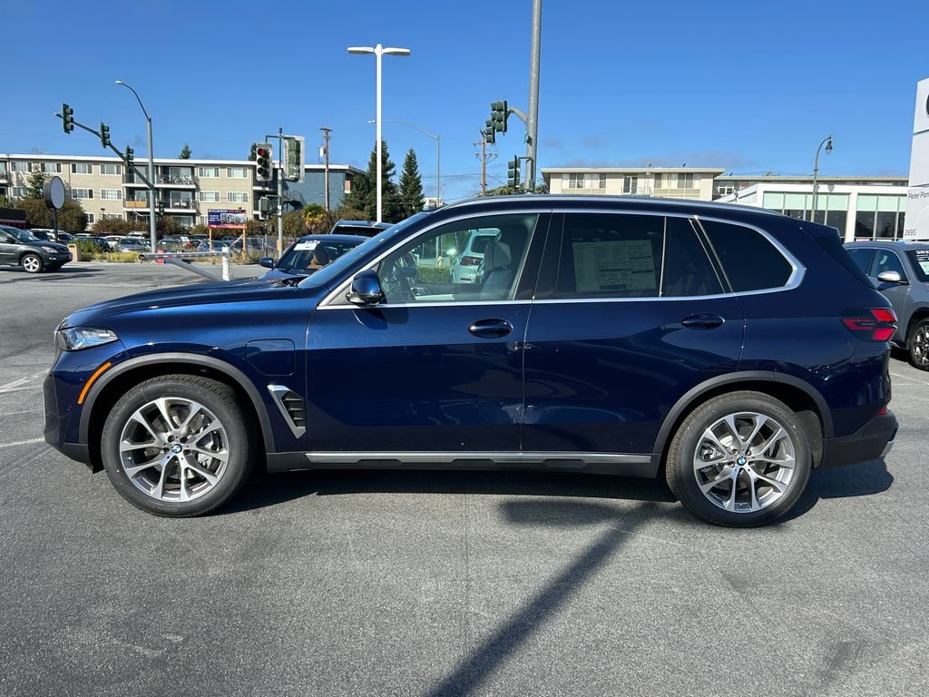 New 2026 Tanzanite Blue II Metallic BMW xDrive50e image 2