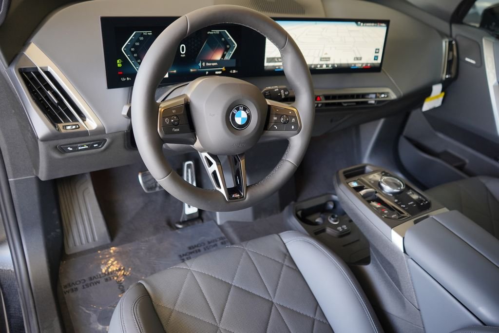 Used 2026 Carbon Black Metallic BMW xDrive60 image 13