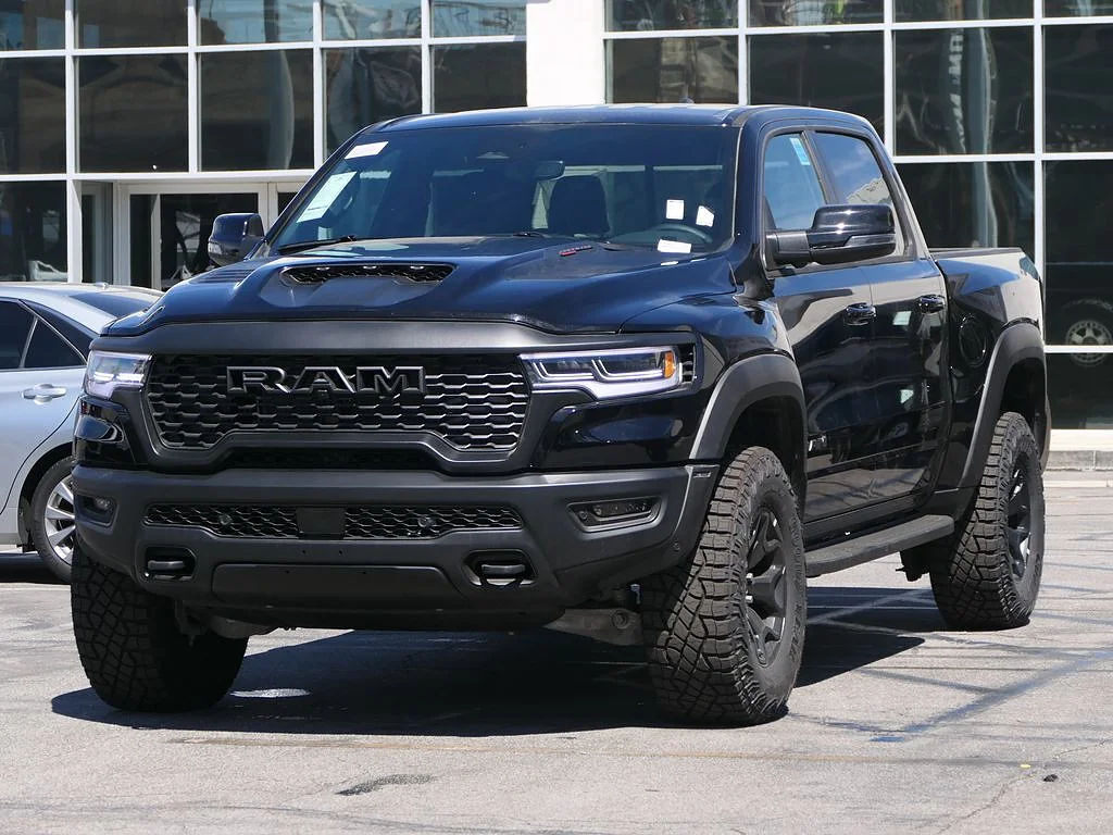 New 2026 Diamond Black Crystal Pearl Coat RAM RHO Crew Cab 4x4 5