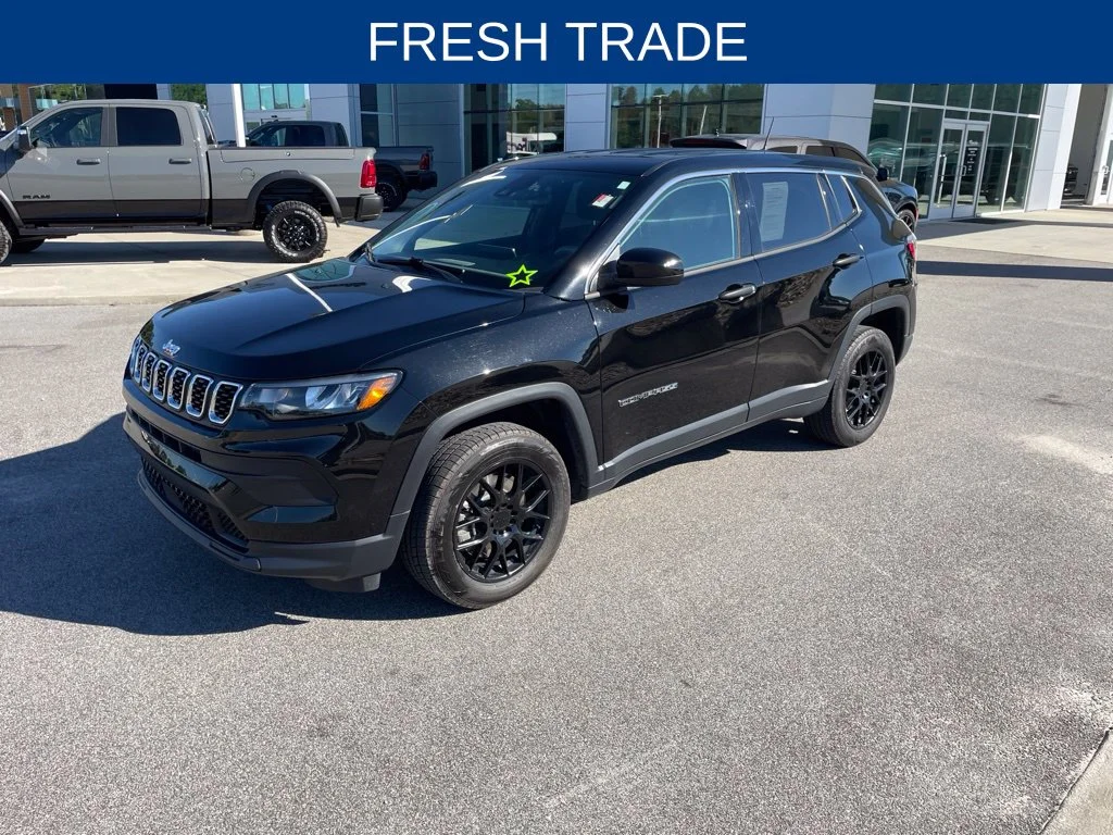 Used 2024 Black Jeep Sport image 1
