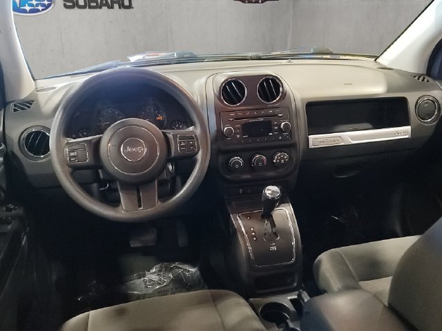 Used 2016 Jeep Compass Sport with VIN 1C4NJDBBXGD668660 for sale in Mandan, ND