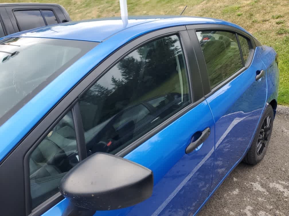 Used 2024 Electric Blue Metallic Nissan S image 4