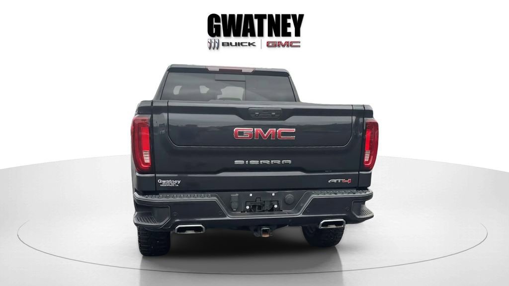 Used 2023 Titanium Rush Metallic GMC AT4 image 4