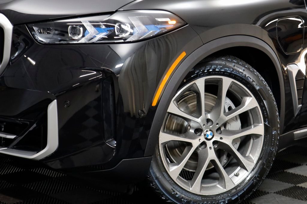 New 2026 Black Sapphire Metallic BMW xDrive50e image 3