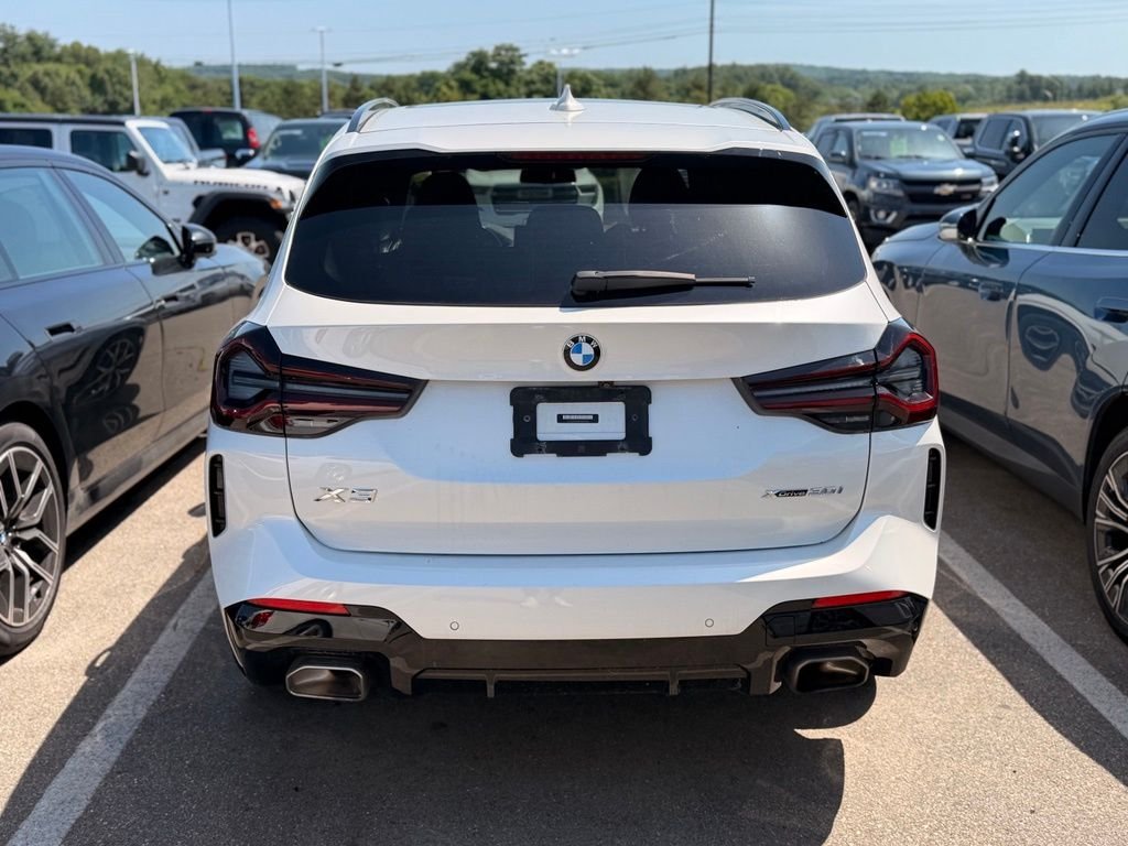 Used 2023 Mineral White Metallic BMW xDrive30i image 4