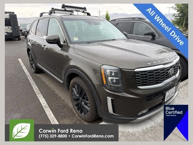 Used 2020 Dark Moss Kia SX image 1