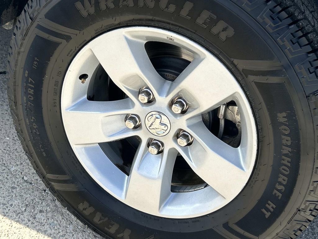 Used 2024 Bright White Cl Ram SLT image 13