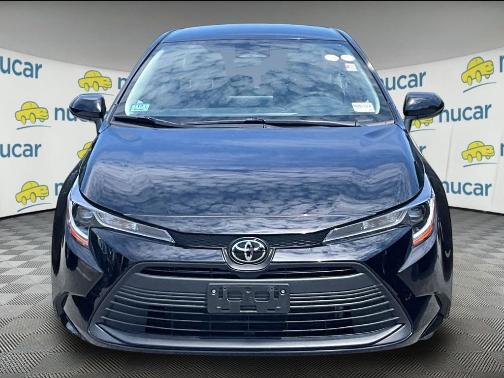 Used 2024 Black Toyota LE image 2