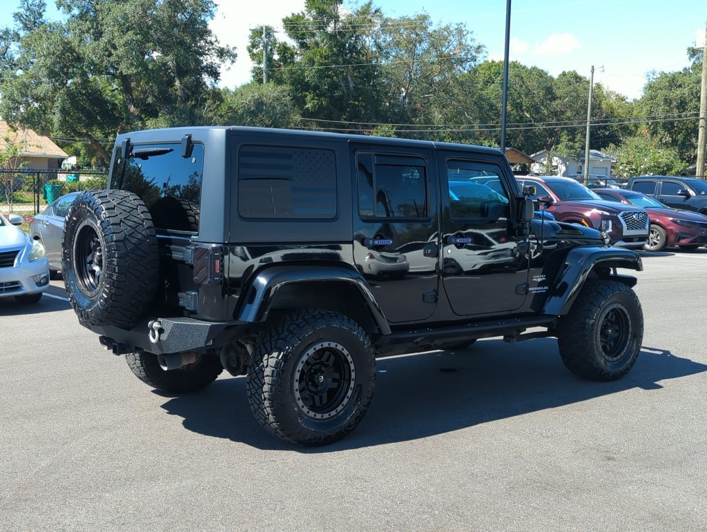 Used 2015 Black Jeep Unlimited Sahara image 7