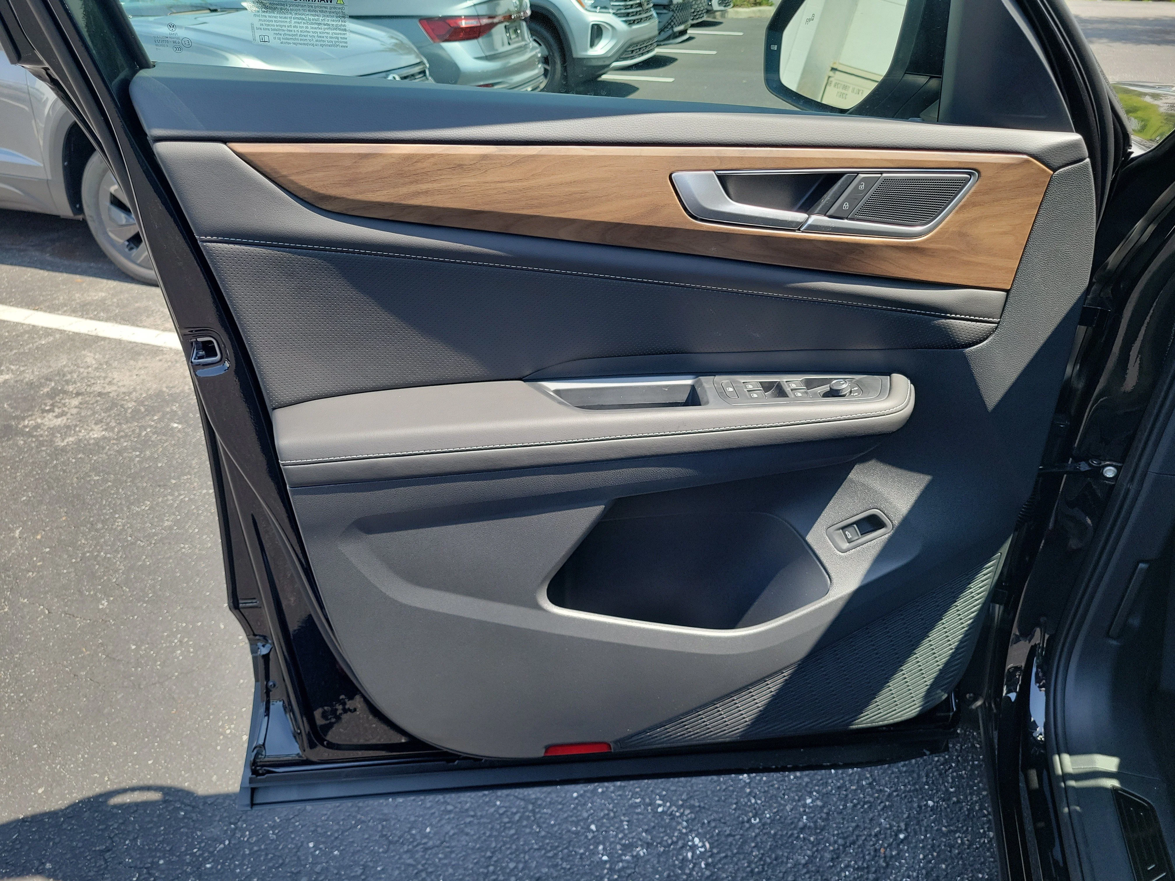 New 2026 Black Volkswagen SE w/Technology image 17