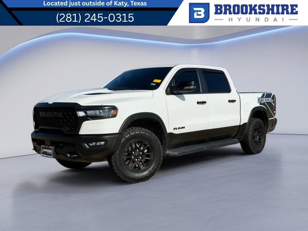 Used 2025 Bright White Clearcoat Ram Rebel image 1