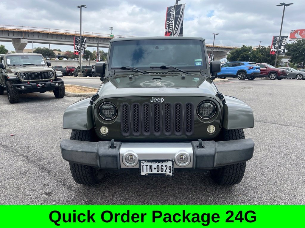 Used 2015 Green Jeep Unlimited Sahara image 2
