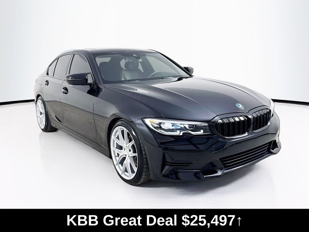Used 2022 Jet Black BMW 330i xDrive image 1