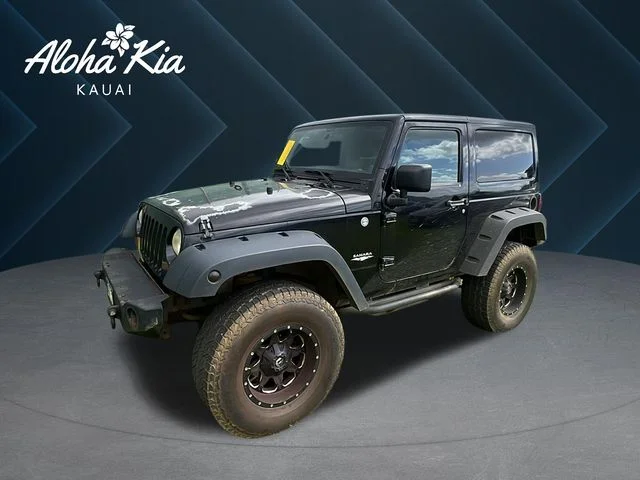 Used 2012 Black Jeep Sahara image 1