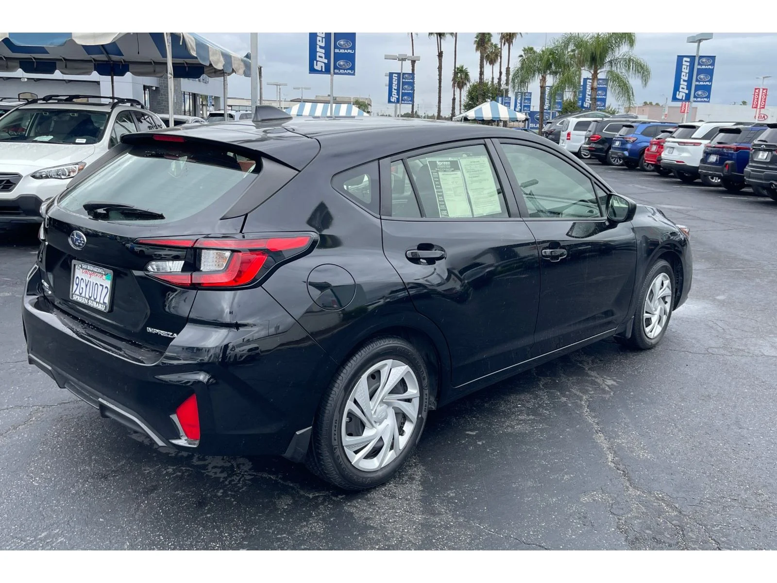 Used 2024 CRYSTAL BLACK SIL Subaru Base image 5