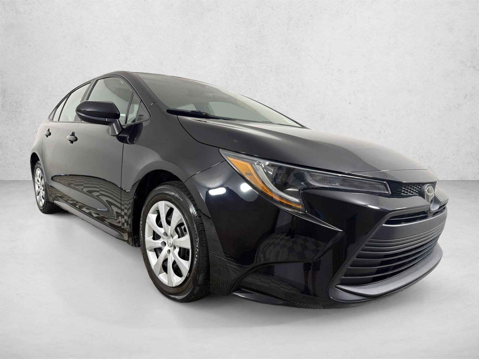 Certified Used 2023 Midnight Black Metallic Toyota LE image 1