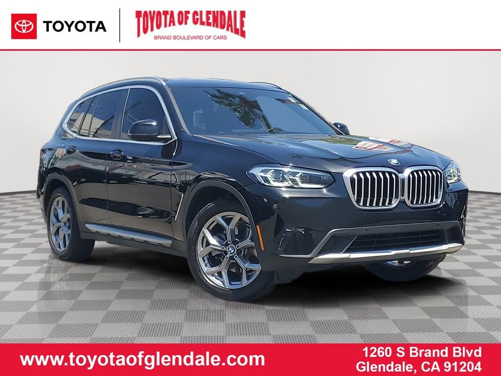 Used 2024 Black Sapphire Metallic BMW sDrive30i image 1